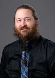 headshot of Joshua Paveglio