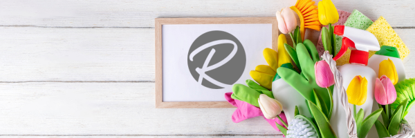 basket of flowers and cleaning supplies.