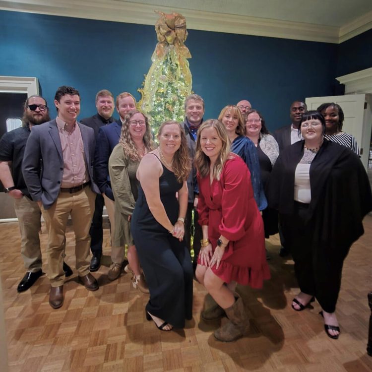 team holiday group photo 2024
