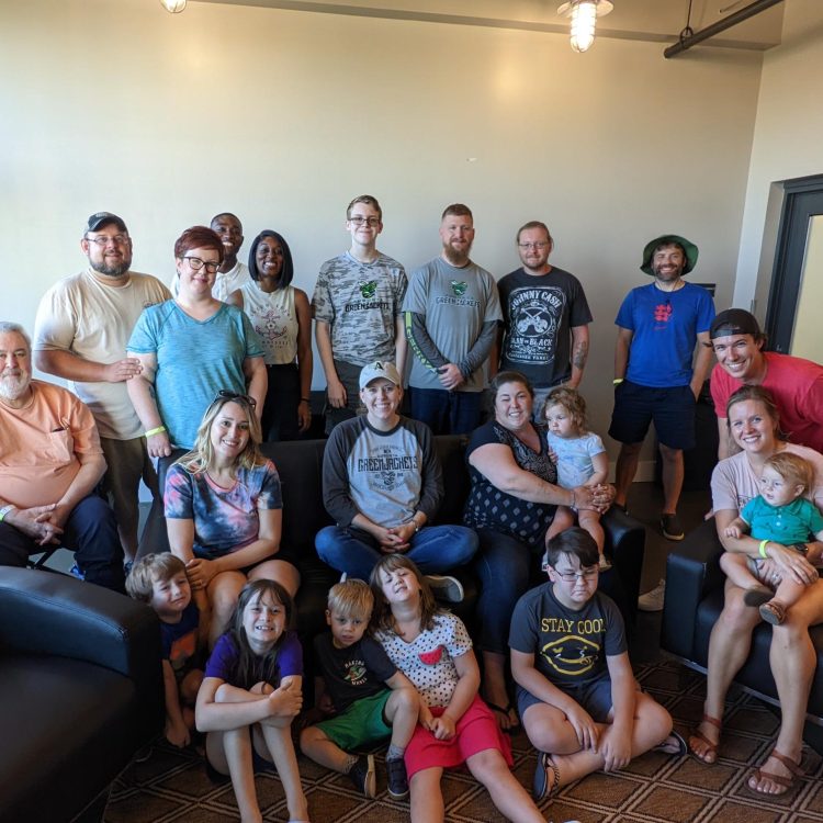 RPS team and their families at a green jackets baseball game in June 2021